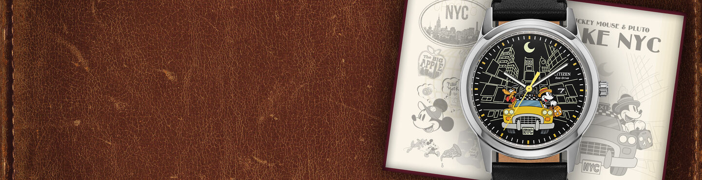 Men's Disney Watches; Featuring Mickey Mouse & Pluto Take NYC watch model AW1860-01W on a leather background