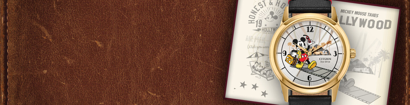 Men's Disney Watches; Featuring Mickey Mouse Takes Hollywood watch model FE7063-07W on a leather background