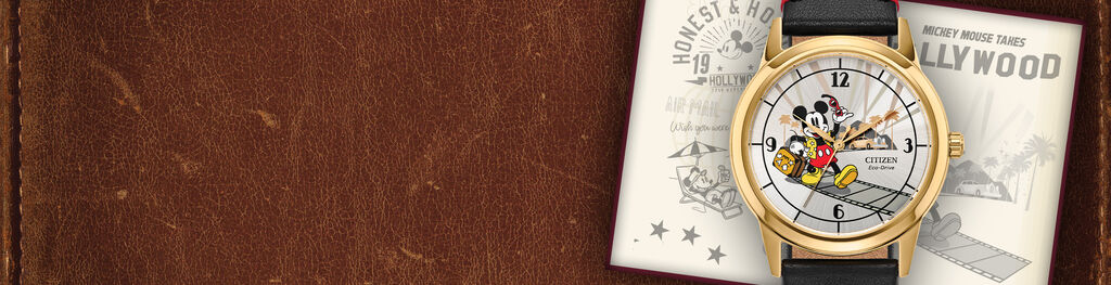 Men's Disney Watches; Featuring Mickey Mouse Takes Hollywood watch model FE7063-07W on a leather background